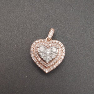  10kt rose gold pendant w/ dia 