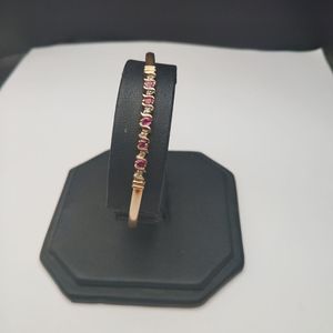  10kt yellow gold bangle bracelet w/ sapphire and diamonds