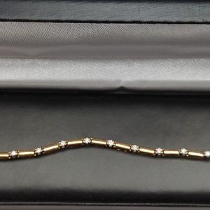  14kt gold bracelet w/ diamonds 