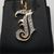  14kt yellow gold "J" pendant w/ cz stones 