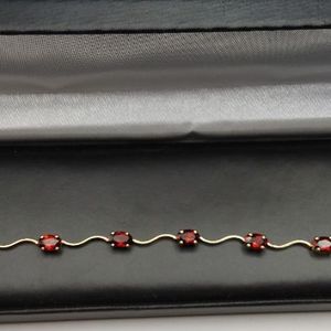  10kt Gold Bracelet with Red stones 