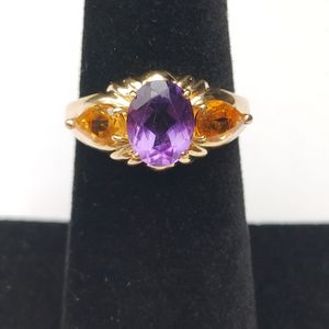  18kt yellow gold ring w/ purple stone 