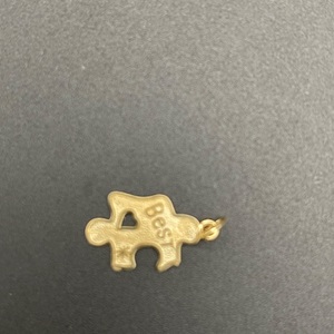  14kt yellow gold "BEST' puzzle piece pendant 